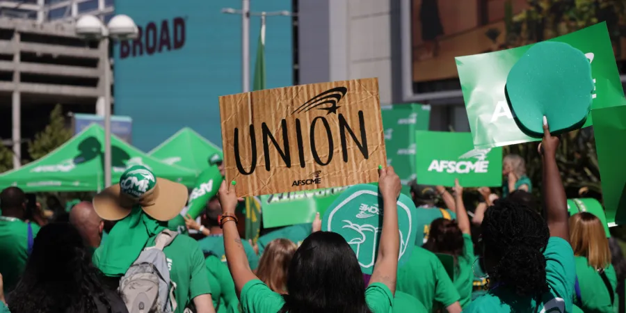 AFSCME Members Holding Signs